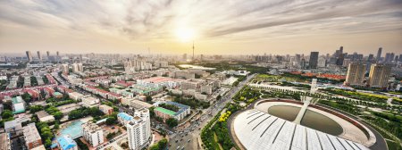 Panoramic modern skyline and buildings during sunset