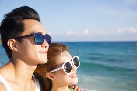 Closeup Happy young Couple face on the Beach