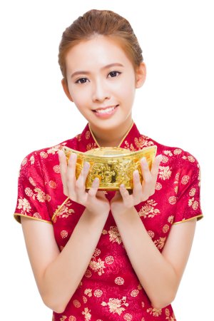 happy young woman showing  gold for chinese new year