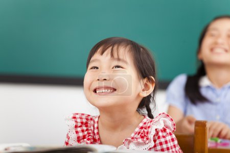 happy little girls in the classroom