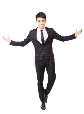 Happy young business man with successful gesture