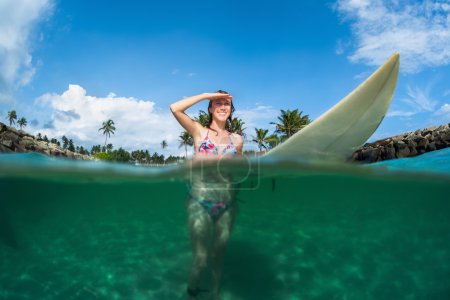 Lady with surf board