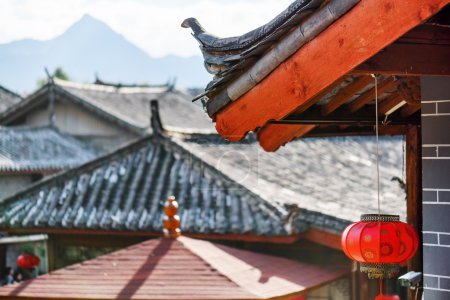 Traditional Chinese roof decorated with red lantern, Lijiang