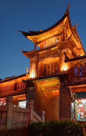 Night view of traditional Chinese wooden building in Lijiang