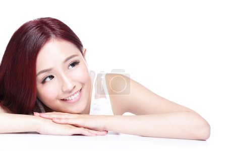 Charming woman lying on hands