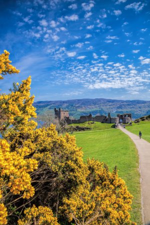 Ruins of Urquhart Castle next to Loch Ness in Scotland