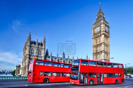 Big Ben with buses in London, England