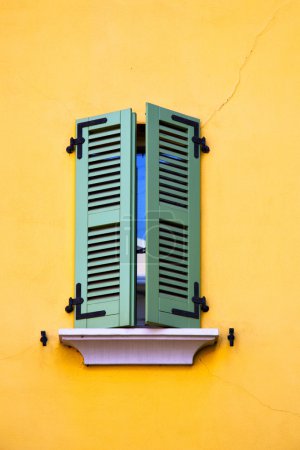 abbiate varese italy  window   yellow wall