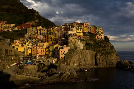 View of Manarola and its harbour at sunset