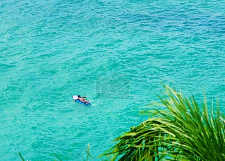 Surfer on Blue Ocean Wave