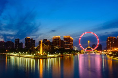 Night scene cityscape of Tianjin ferris wheel,Tianjin eyes  in  twilight time.Most Modern and popular landmark in Tianjin city.