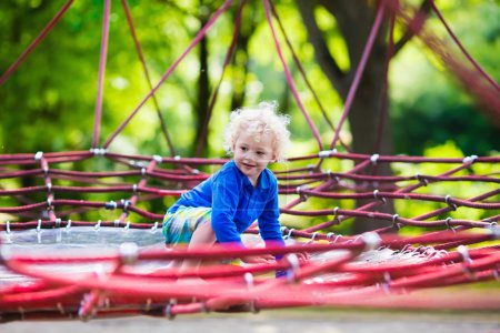 Child having fun on school yard playground