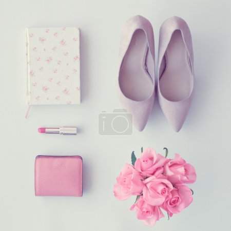 Notebook, shoes, roses, lipsctick