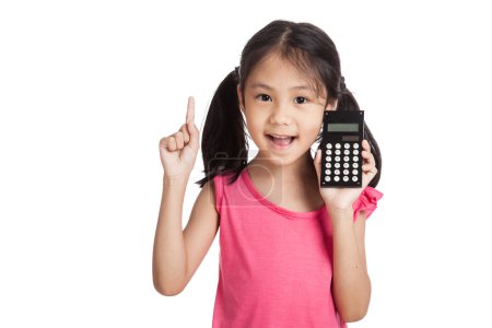 Little asian girl with a calculator