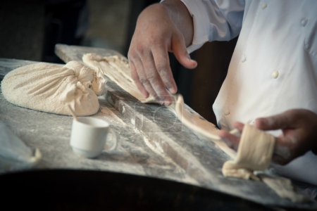 photo set of process deep fried dough stick  ' patongko ' 