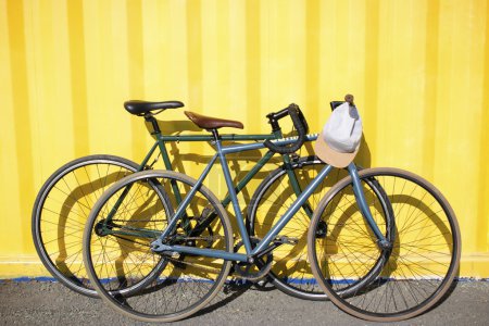 sport bikes on each other on a yellow background