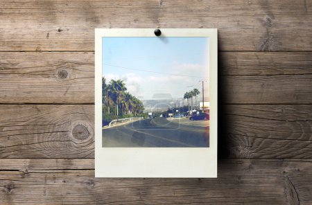 Instant photo frame on wall.Polaroid-style image