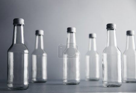 Set of empty cristal unlabeled bottles