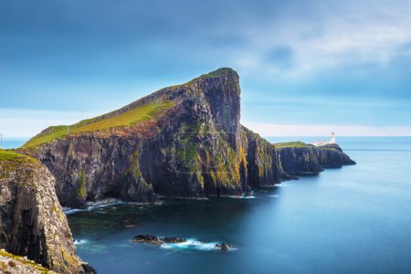 Neist Point and the lighthouse on Isle of Skye before sunset - Scotland, UK