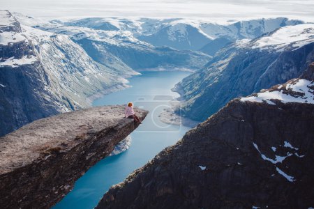 Girl on a rock , Norway fjords