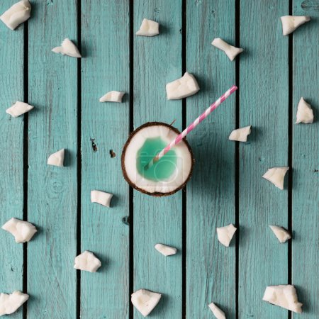 Coconut pattern on wooden background.