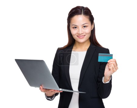 Woman with laptop credit card