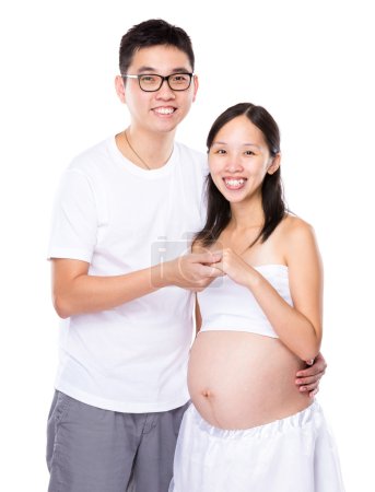 Asian couple with pregnant wife