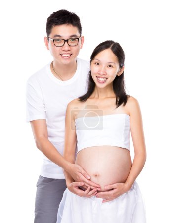Young couple with pregnant wife