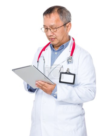 Asian old doctor with stethoscope