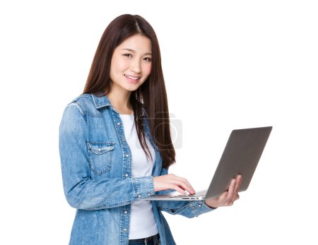 Asian young woman in jean shirt