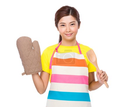 Asian young housewife in apron