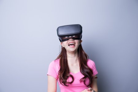 Woman using VR headset glasses