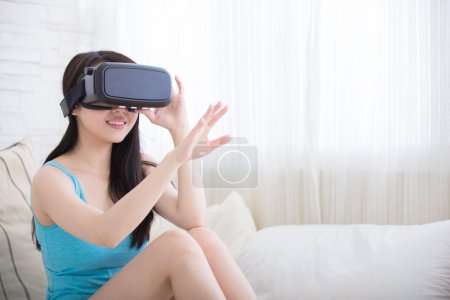 Woman using the virtual reality headset