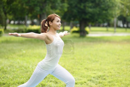 Young sport girl do yoga