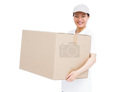 Delivery woman carrying box