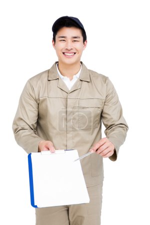 Happy delivery man with clipboard