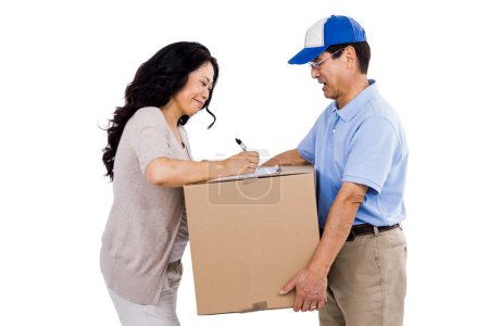 Woman signing for a package