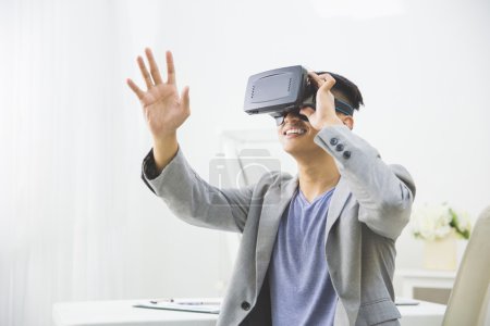 Man wearing virtual reality goggle