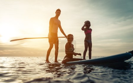 Happy family Surfing