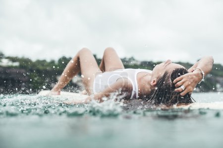 Beautiful woman  in the ocean surf