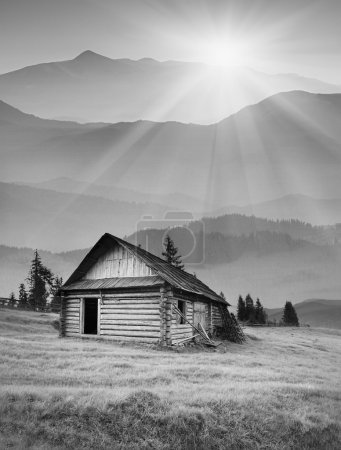 Foggy mountain village. Black and white