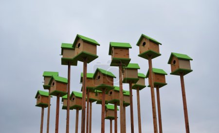 Colorful nesting boxes on grey sky